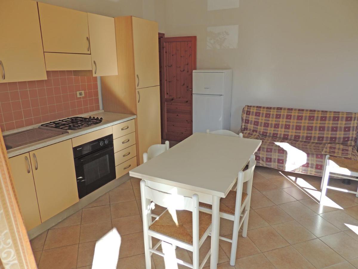 Residence Della Torre Isola Rossa Bagian luar foto
